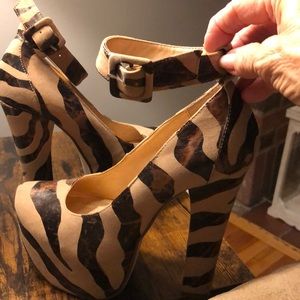 Brown/Beige Tiger print platform heels with ankle straps size 7M. Slightly worn